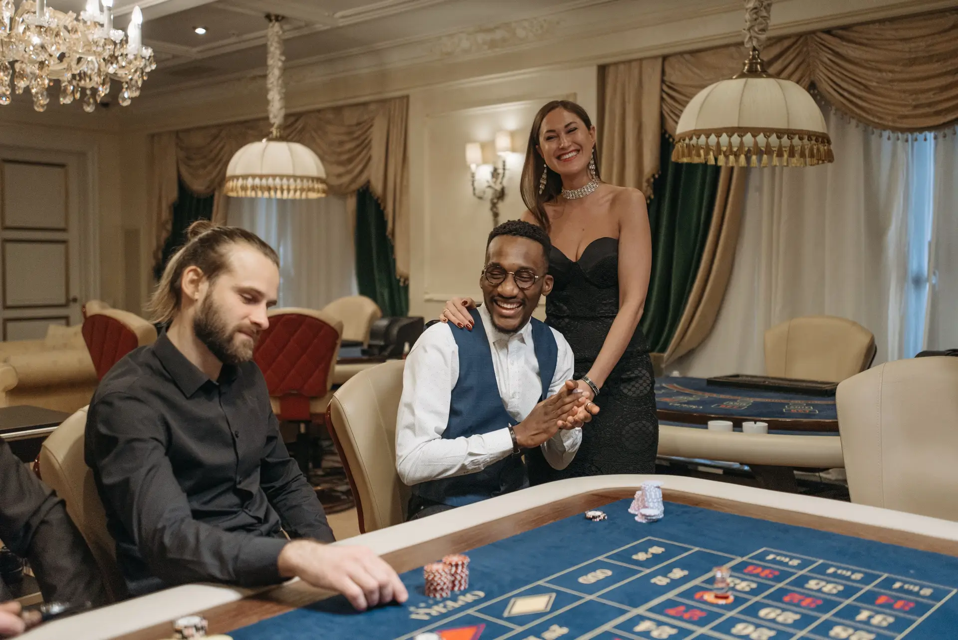 Guests enjoying a sophisticated night at the gaming tables